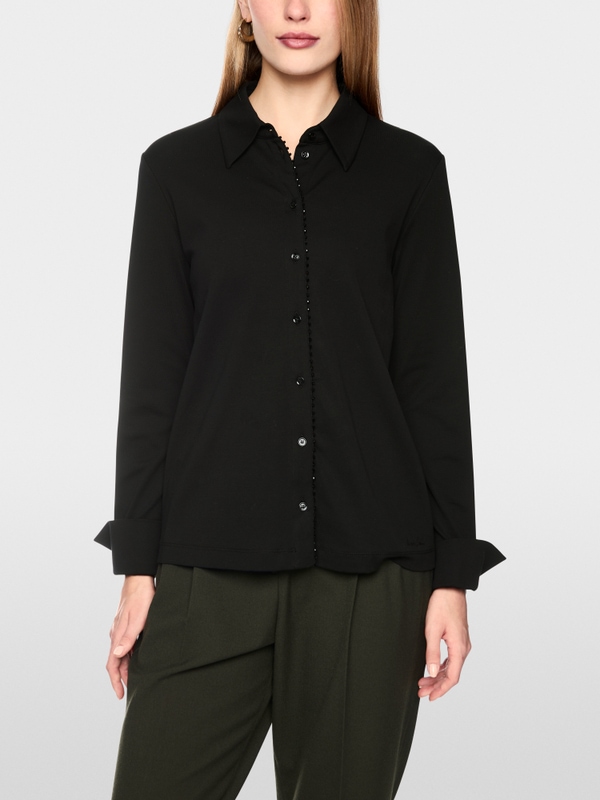 Blouse with glitter buttoning