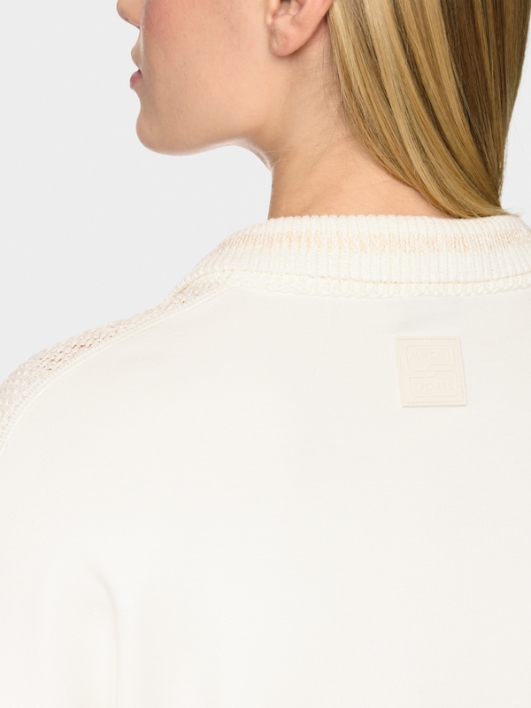‘Knitted in Germany’ V-neck jumper