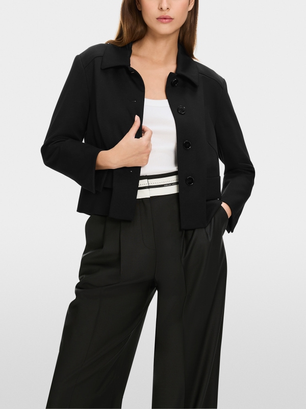 Veste courte manches fendues