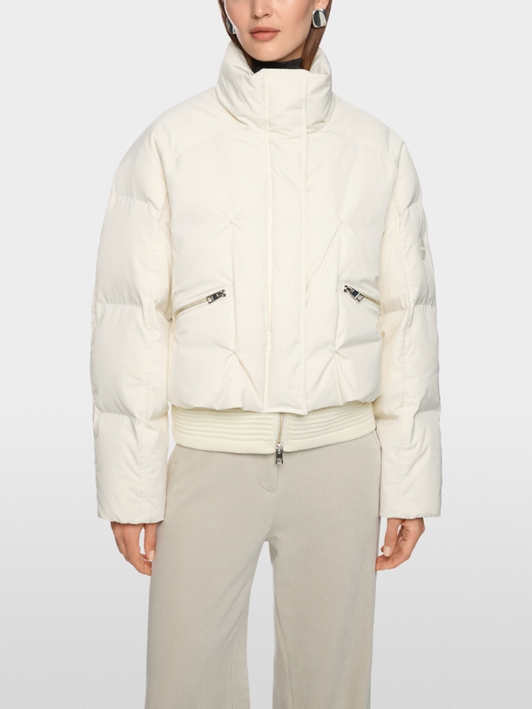 Quilted down jacket with knitted cuffs