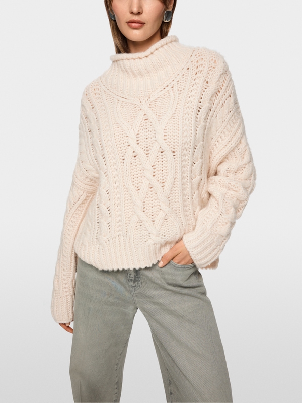 Tricoté en Allemagne Pull à motif torsadé