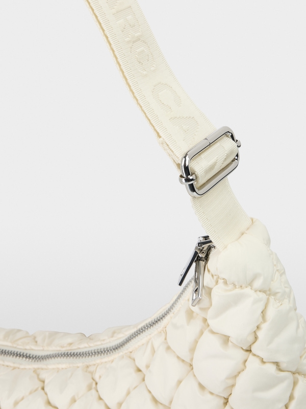 Half-moon quilted design shoulder bag