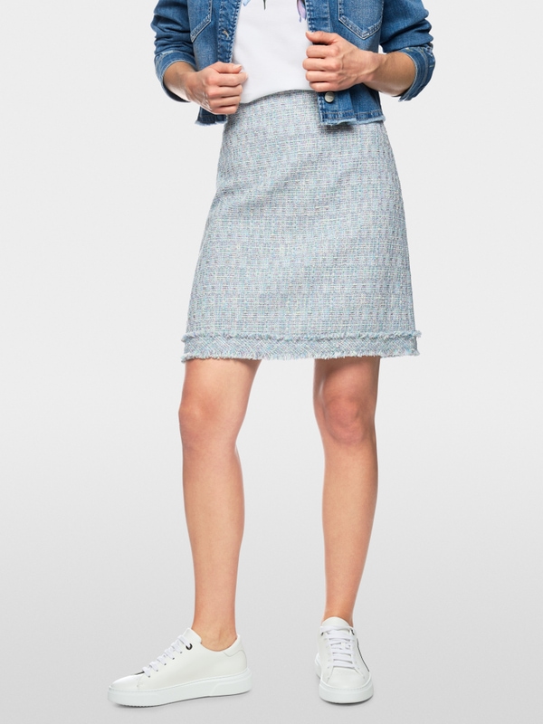 Mini-jupe en bouclé à franges