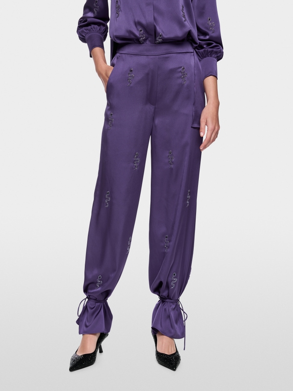 WELKOM snake embellishment trousers