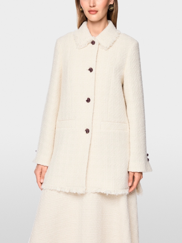 Bouclé jacket with fringing