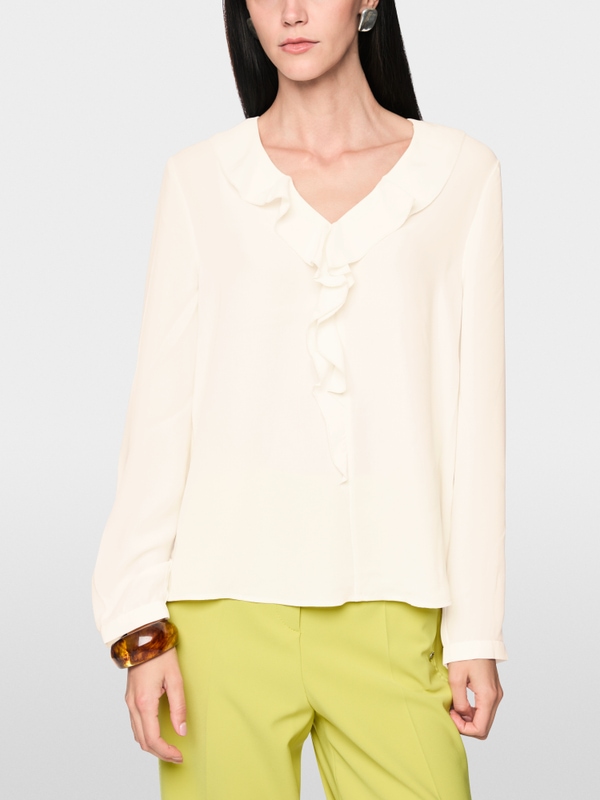 Blouse with flounces