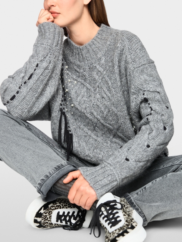 Cable-knit jumper with details