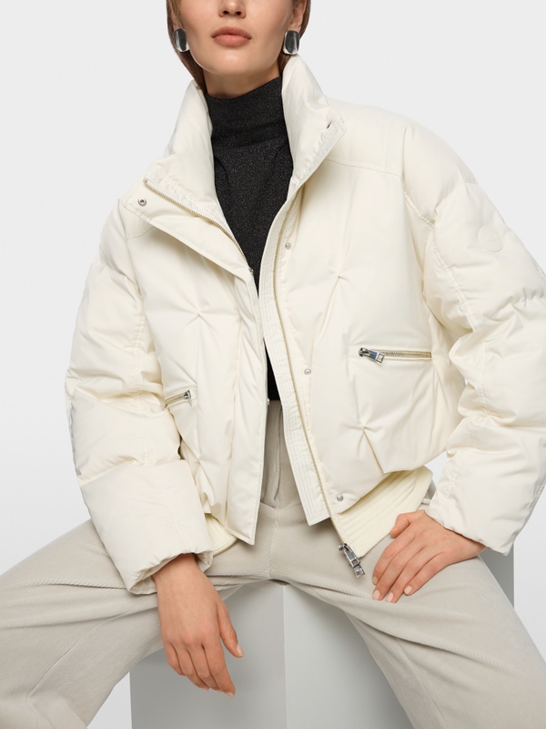 Quilted down jacket with knitted cuffs