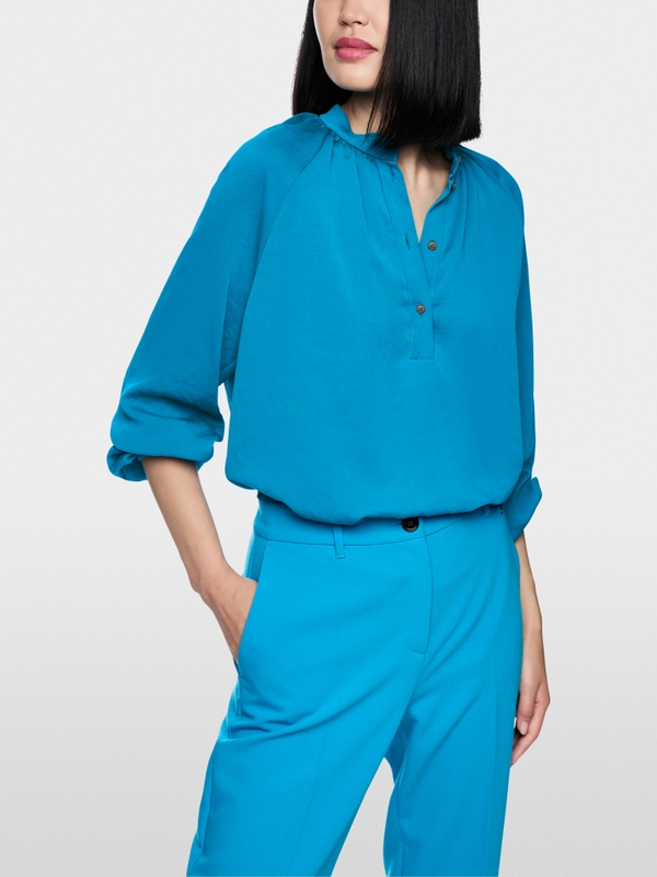 Blouse à col montant « Rethink Together »