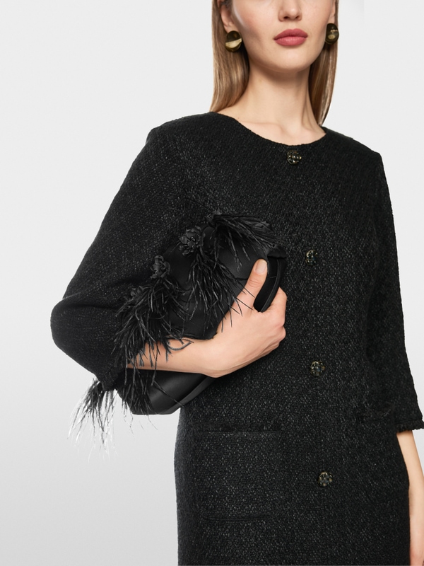 Elegante clutch met veren