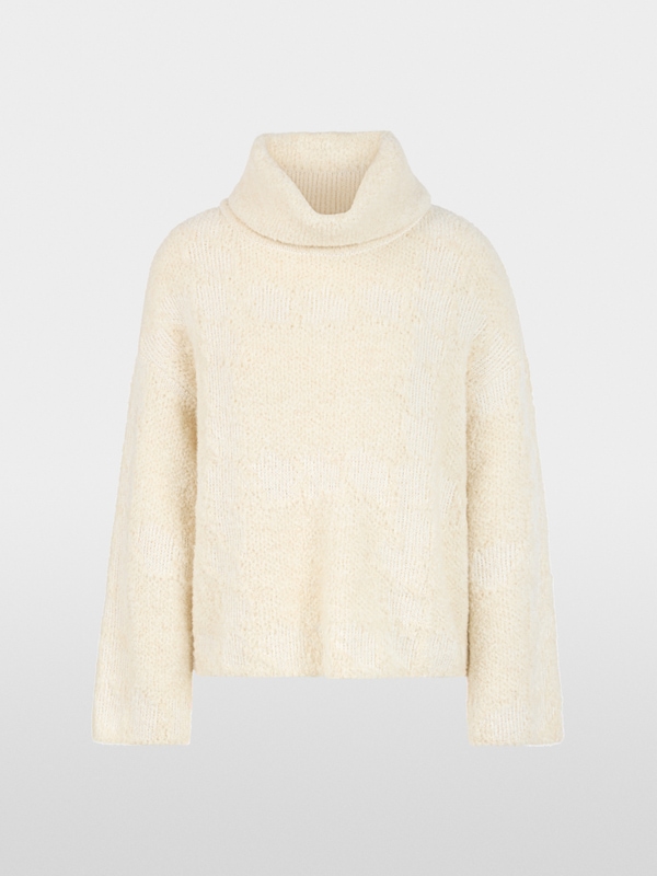 ‘Knitted in Germany’ turtleneck jumper