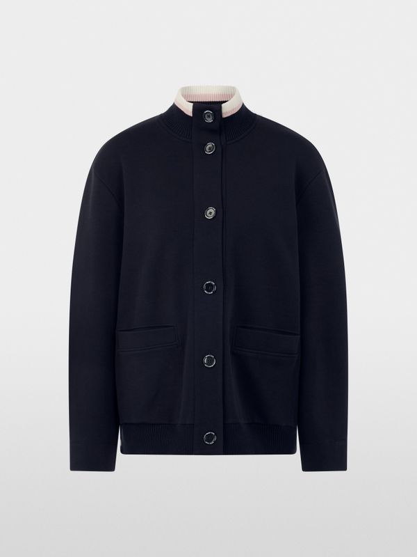 Jacket with knitted details