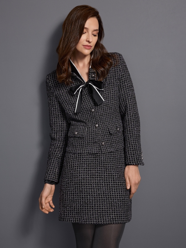 Tweed skirt with chain detail