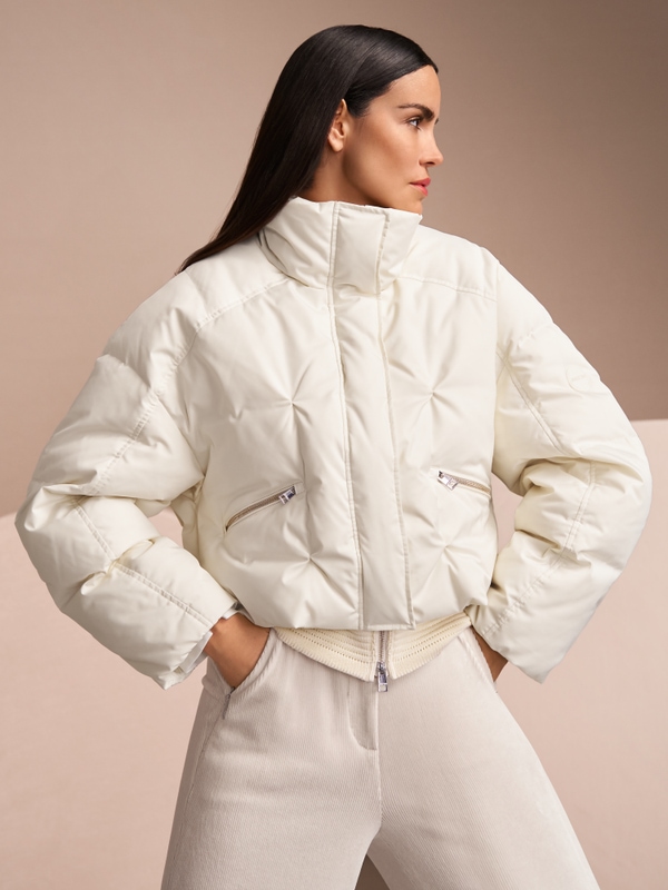 Quilted down jacket with knitted cuffs