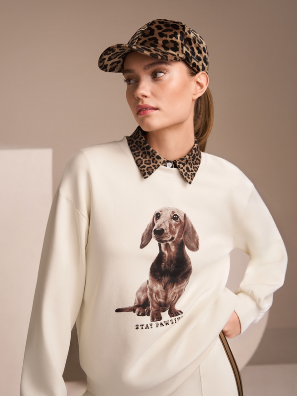 Plain polo shirt with leopard details