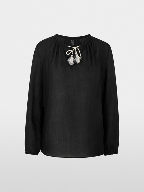Delicate blouse with tassels