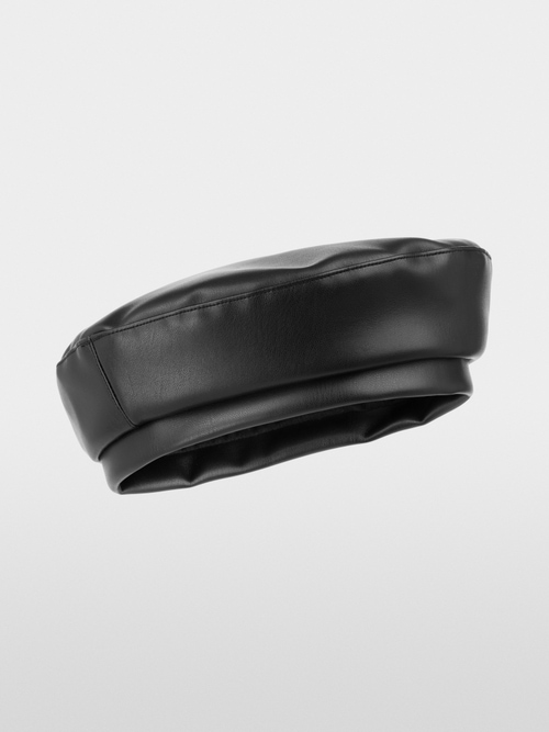 Trendy hat in faux leather